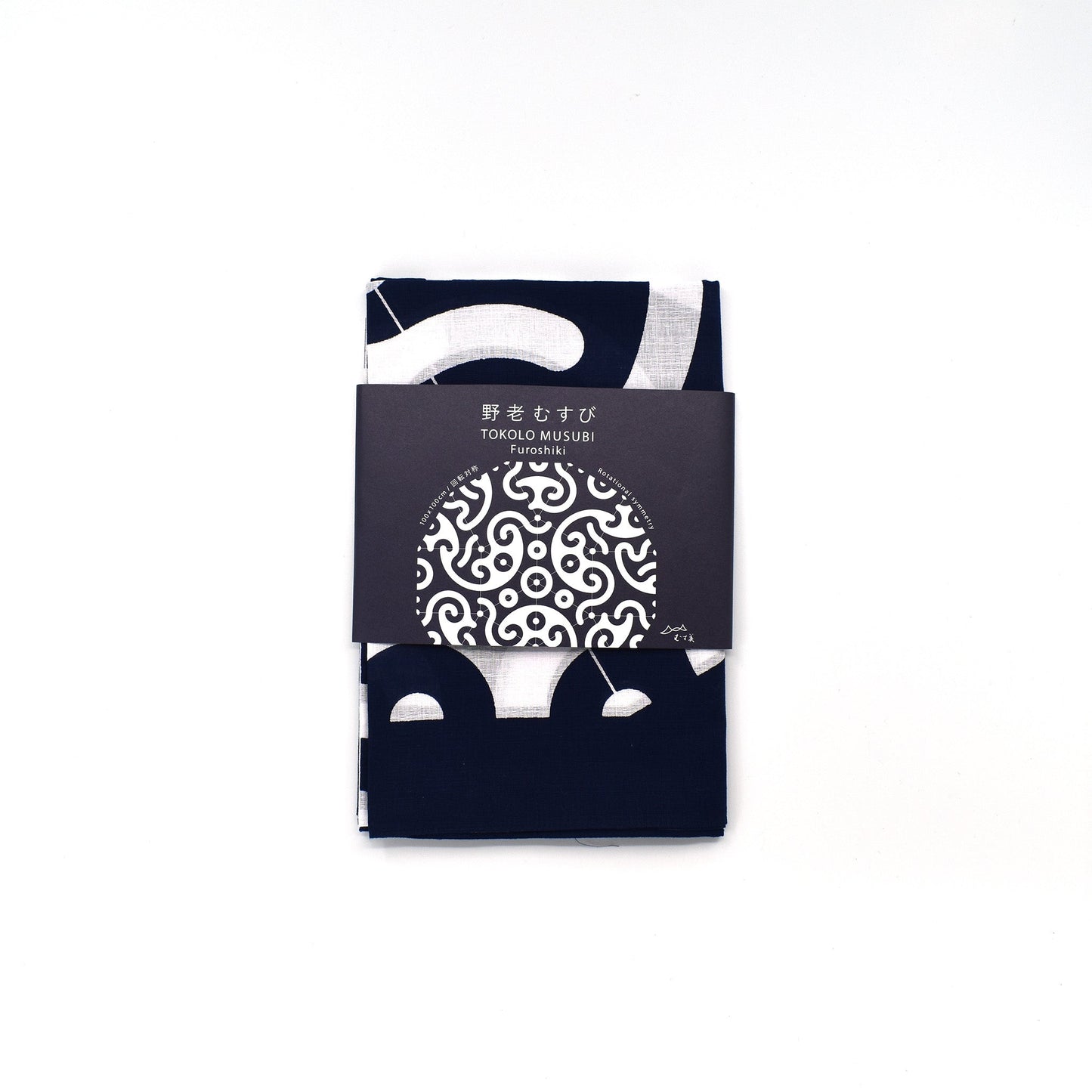 Folded Tokolo Musubi furoshiki cloth with indigo and white geometric wave pattern, wrapped in a minimalist black paper band with Japanese text and design preview.