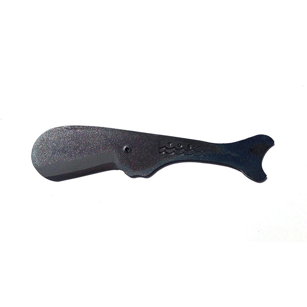 Sperm Whale Kujira knife handcrafted in Japan from carbon steel, featuring a rounded blade tip and whale-inspired silhouette with engraved wave motif