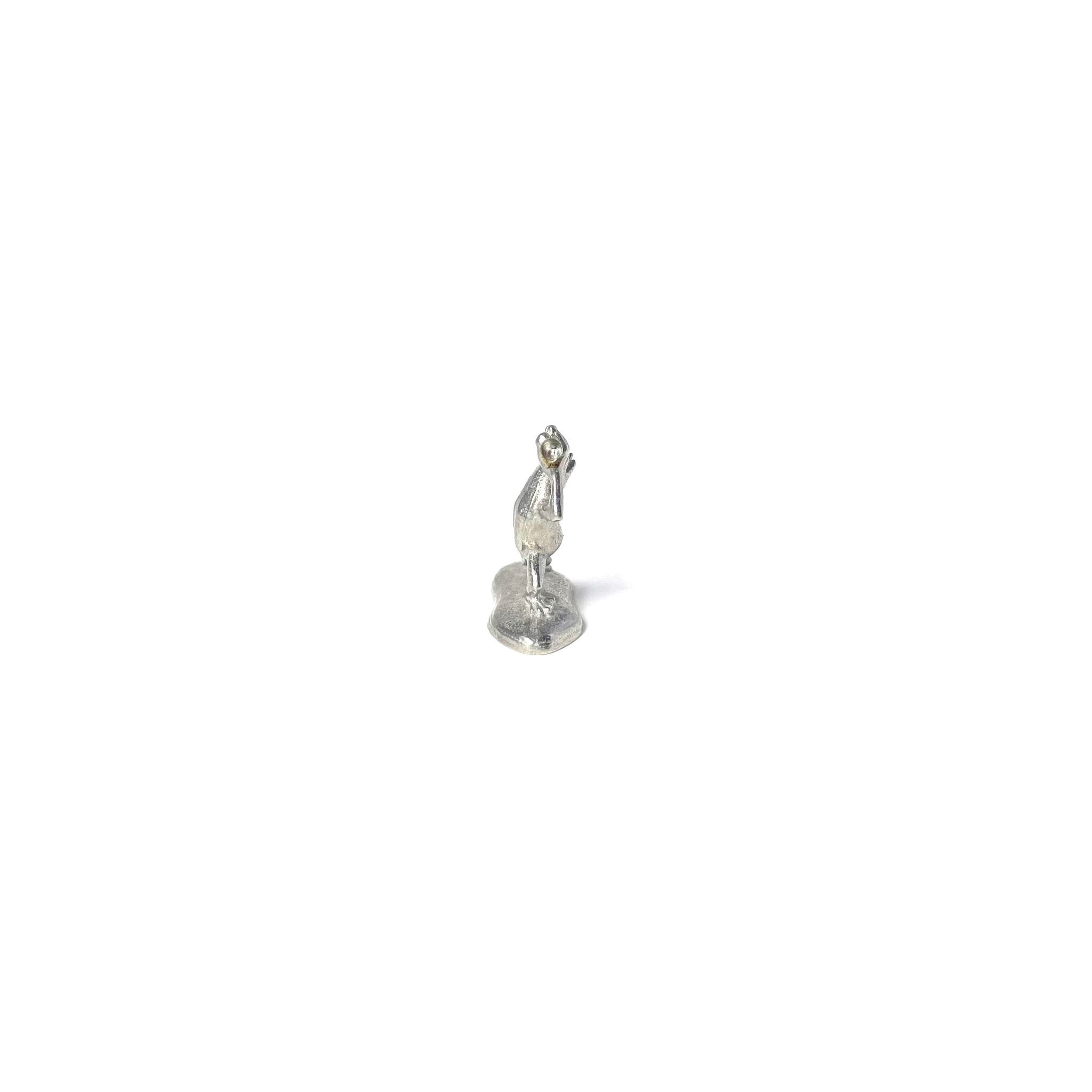 Chōjū-Giga inspired pewter bird incense holder standing upright on a white background, handcrafted in Japan with playful historic detail.