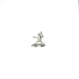 Pewter incense holder shaped like a frog from the Chōjū-giga scrolls, holding incense in a dynamic pose on a white background.