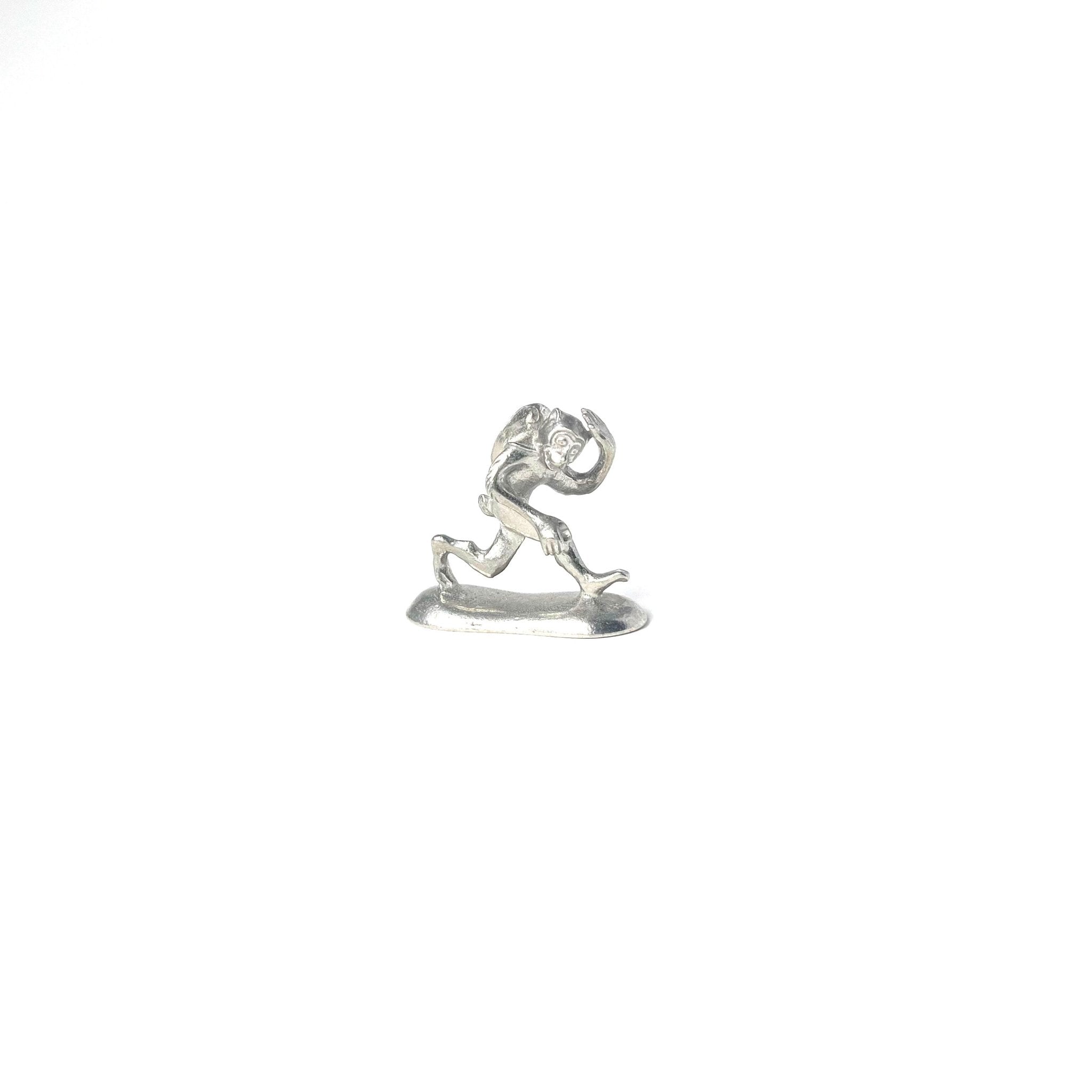 Metal incense holder shaped like a running monkey from the Chōjū-giga scrolls, inspired by Japan’s oldest manga artwork, used for traditional Japanese incense rituals.