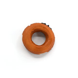 Top-down view of a realistic chocolate-glazed donut phone stand with a clean circular shape and visible icing on one side.