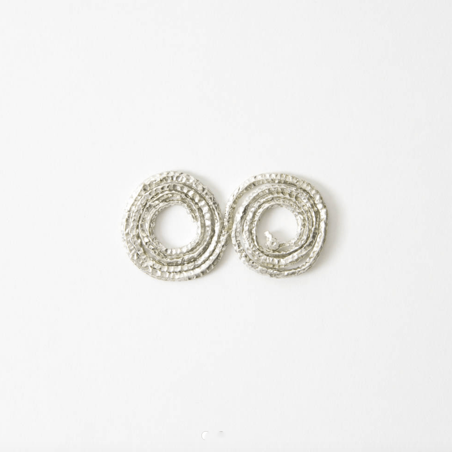 Silver double spiral metal coil flower holder insert for minimalist floral arrangements, displayed on a clean white background.