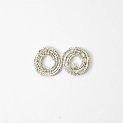 Silver double spiral metal coil flower holder insert for minimalist floral arrangements, displayed on a clean white background.