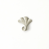 lver pewter incense holder shaped like a ginkgo leaf, displayed on a white background