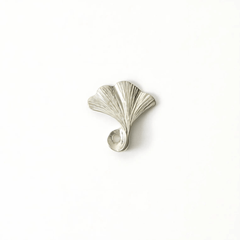 lver pewter incense holder shaped like a ginkgo leaf, displayed on a white background