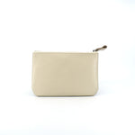 Ivory leather zip pouch with smooth finish on white background, perfect for storing daily essentials, makeup, or tech accessories