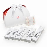 Japanese Precision Kitchen Set, the gift box beside the six stainless tools in their individual boxes and the wrapped cloth.