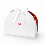 Japanese Precision Kitchen Set, the closed white gift box with a red ribbon bow.