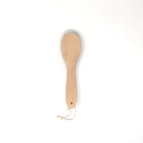 Natural wood replacement base for Kanaya lint brushes, handcrafted in Japan with a smooth finish and hanging loop, designed for easy bristle refitting.