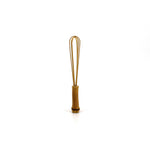 A small handcrafted bamboo whisk with a natural finish, perfect for delicate kitchen tasks or as a decorative traditional tool.