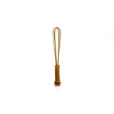 A small handcrafted bamboo whisk with a natural finish, perfect for delicate kitchen tasks or as a decorative traditional tool.