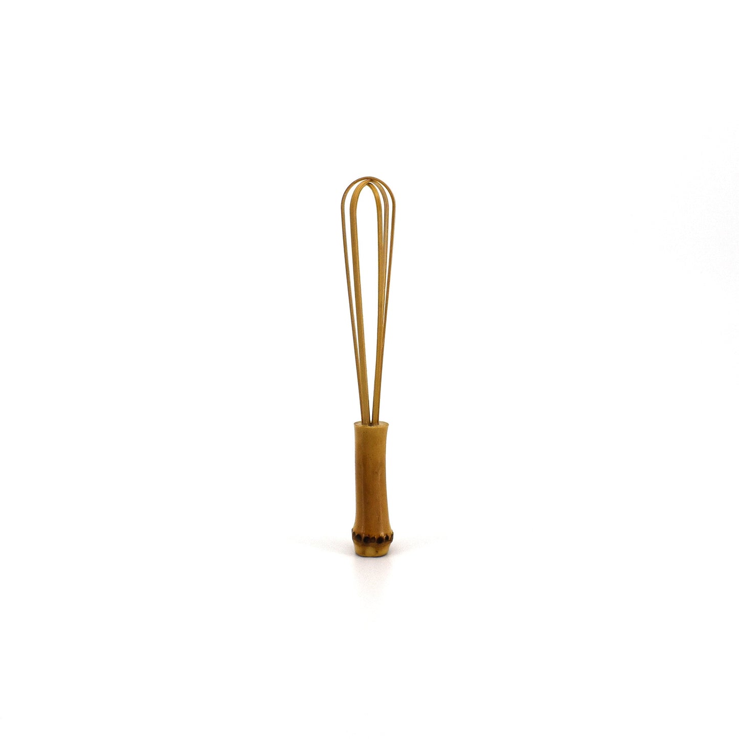 A small handcrafted bamboo whisk with a natural finish, perfect for delicate kitchen tasks or as a decorative traditional tool.