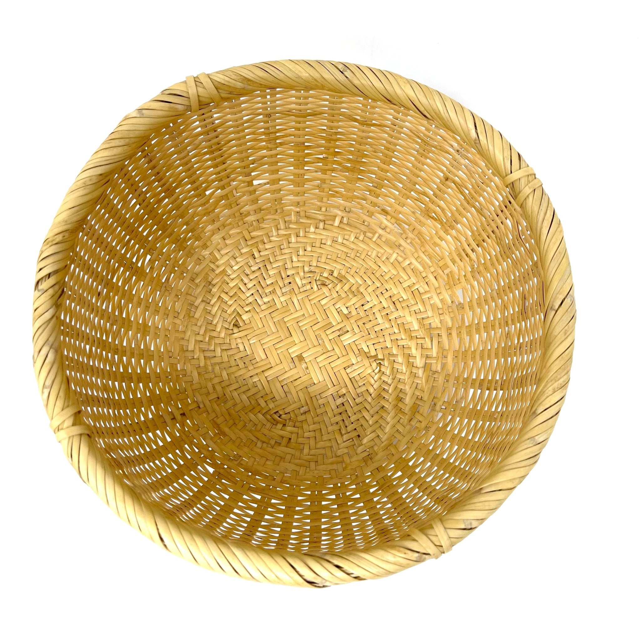 Top-down view of round Japanese bamboo basket with intricate handwoven base and natural rim, ideal for straining, serving, or decorative use
