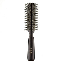 Front view of the Kanaya Natural Bristle Hair Brush with a polished dark wood handle and soft boar bristles, handcrafted in Japan since 1880.