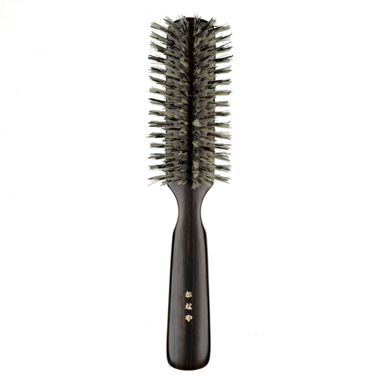 Front view of the Kanaya Natural Bristle Hair Brush with a polished dark wood handle and soft boar bristles, handcrafted in Japan since 1880.