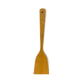 Top-down view of the artisan bamboo cooking turner showing the flat back side of the spatula with a smooth, natural grain finish and a rounded hanging hole at the end of the handle for easy storage.