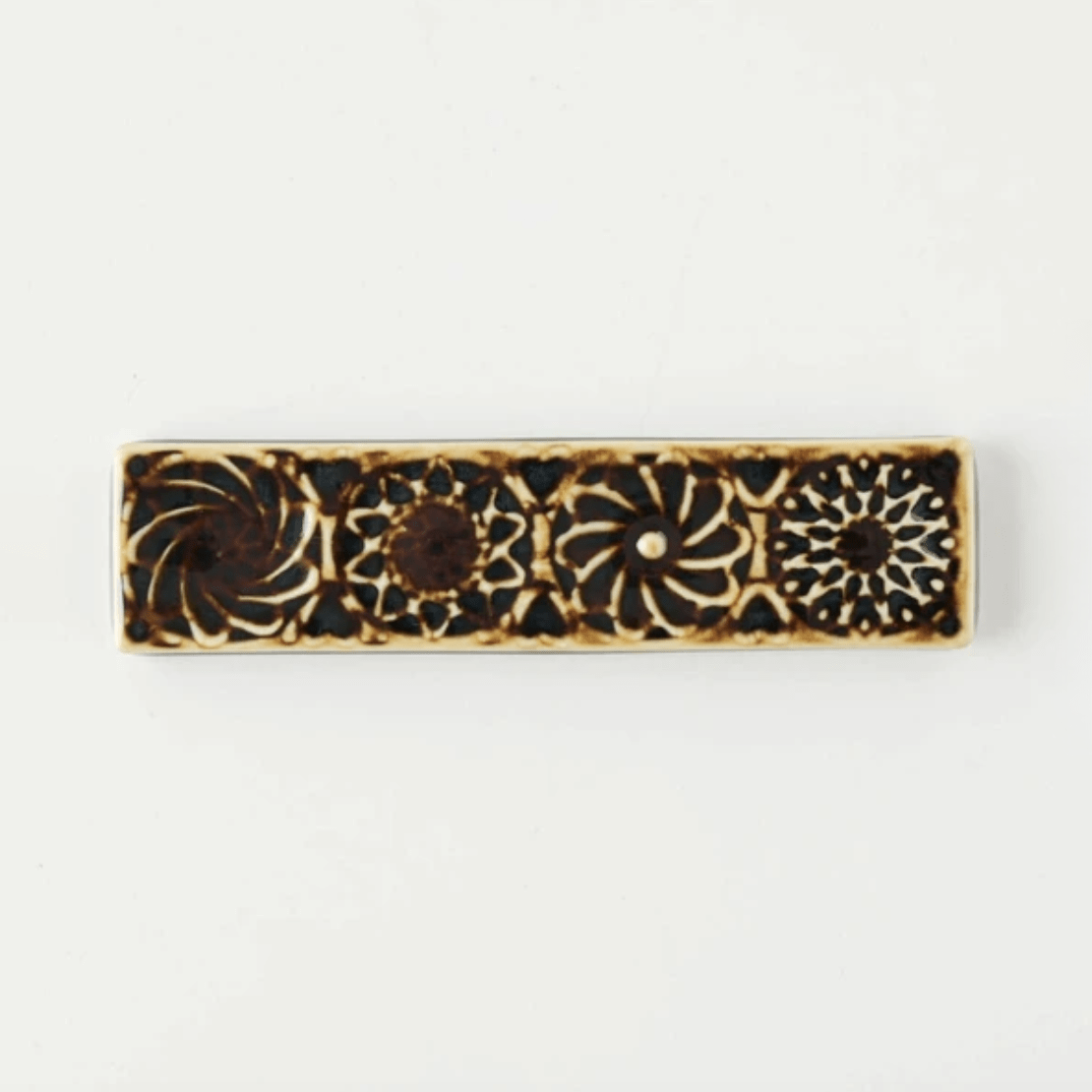 Botanical Motif Cutlery Rest — Amber