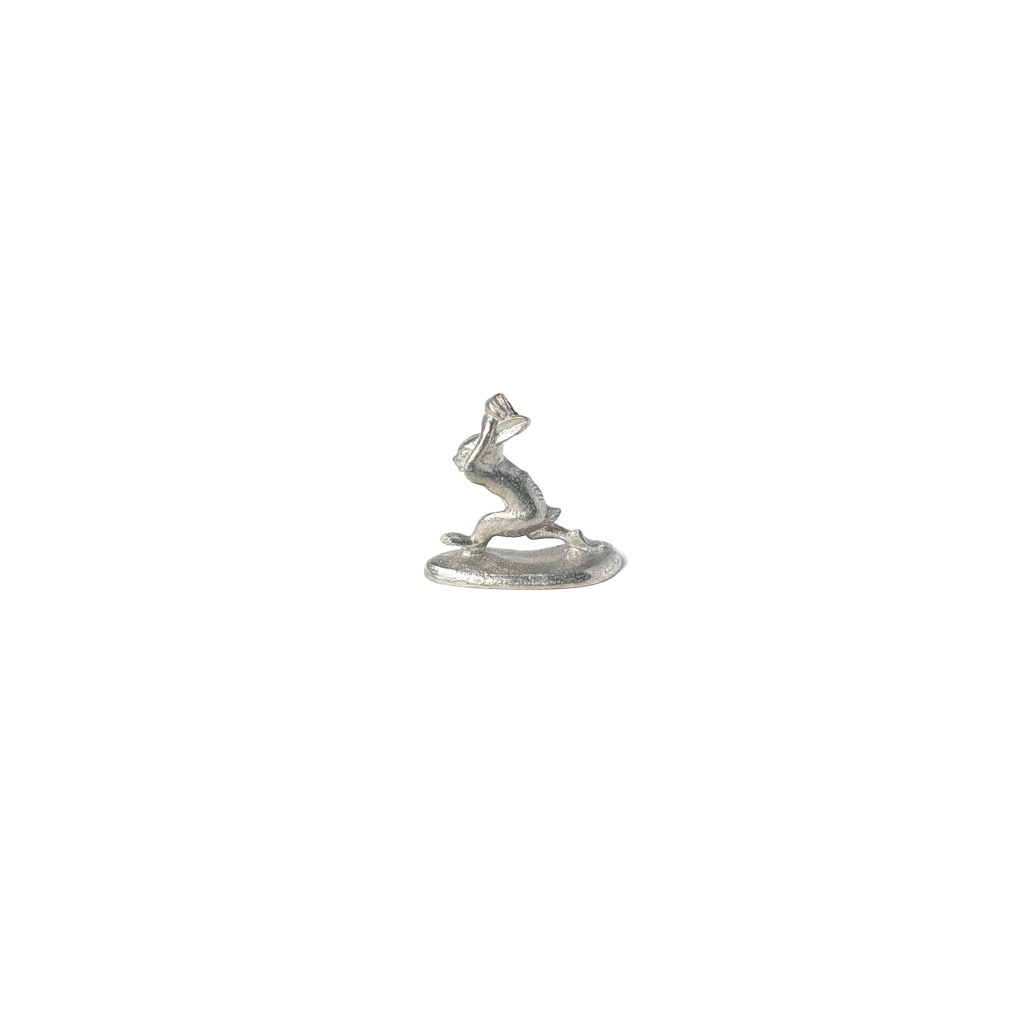 Handcrafted pewter incense holder featuring a Chōjū-giga rabbit leaping mid-run, inspired by Japan’s iconic animal caricature scrolls. Ideal for minimalist and traditional Japanese decor.