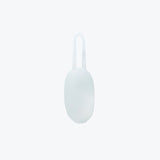 Minimalist white Cocoon Eco Bag case with soft matte finish and built-in loop handle for easy portability. The compact oval design stores a full-sized eco bag inside, perfect for daily shopping or travel.