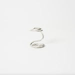 Elegant handcrafted silver spiral flower holder designed for minimalist ikebana and contemporary floral arrangements, perfect for elevating single stems or trailing plants in modern home decor. 