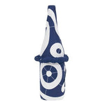 Single wine bottle wrapped in indigo blue and white Japanese furoshiki cloth featuring circular wave patterns, tied in a traditional gift presentation style.