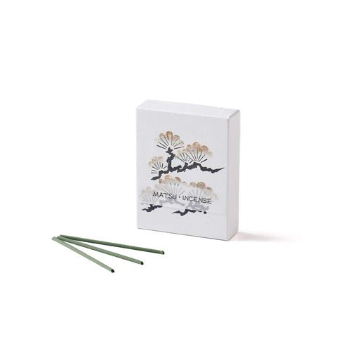 Box of Japanese Hanga Pine incense with three green matsu-scented sticks displayed, featuring elegant pine tree illustration on minimalist packaging