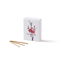 Box of Japanese Hanga Plum incense with three ume-scented sticks displayed, featuring minimalist packaging with plum blossom illustration