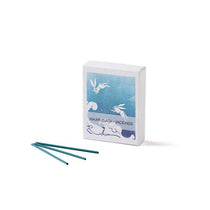 Hanga Wave incense box with blue rabbit illustration and three teal incense sticks displayed on white background