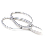 Hidehisa stainless steel ikebana shears with a polished finish, showcasing wide looped handles and sharp, short blades designed for precise floral trimming.