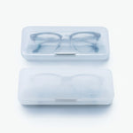 ICED glasses case by 100 percent, stacked in clear and aged finishes with semi-transparent ice block design, made in Japan