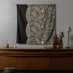 ISA Monyo Yui furoshiki in iron black displayed as wall decor, traditional Japanese wrapping cloth used as textile art.