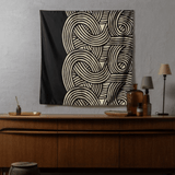 ISA Monyo Yui furoshiki in iron black displayed as wall decor, traditional Japanese wrapping cloth used as textile art.