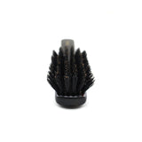 Close-up front view of a Japanese Kanaya hair brush showcasing densely packed black natural bristles arranged in a round pattern, ideal for detangling and smoothing hair.