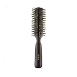 Japanese round hair brush made with soft natural bristles and a dark ebony wood handle, designed for gentle styling, smoothing, and adding shine.