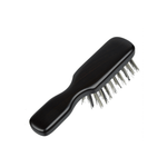 Angled back view of the Kanaya travel hairbrush showing its smooth, dark wooden handle and natural bristles. A compact, elegant brush ideal for travel or daily touch-ups.