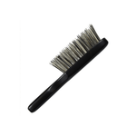 Side view of the Kanaya travel hairbrush with soft boar bristles and a compact black wooden handle. Designed for on-the-go grooming, the slim profile makes it easy to pack without sacrificing brushing performance.