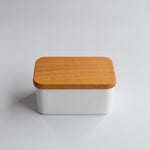 Front view of Noda Horo enamel butter case with wooden lid, minimalist Japanese kitchen storage container.