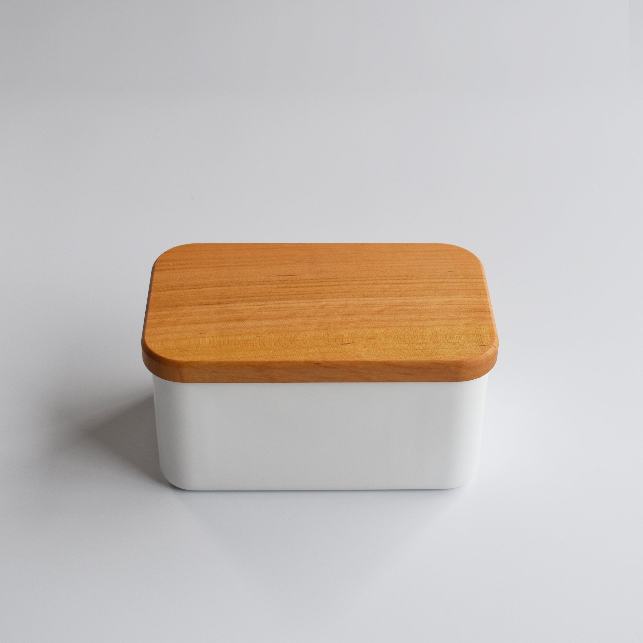 Front view of Noda Horo enamel butter case with wooden lid, minimalist Japanese kitchen storage container.
