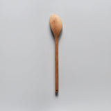 Sakura wood soup spatula with long handle and smooth carved spoon shape shown on a white background