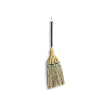 Traditional Japanese Edo-style broom handcrafted by Shirokiya Denbei artisans, featuring a short, dark wooden handle and tightly bound natural straw bristles. The bristle base is intricately woven with decorative green and black thread bands, showcasing the refined aesthetics and durability of Edo-period craftsmanship. Ideal for indoor sweeping, this broom blends practicality with timeless design, reflecting centuries-old Japanese broom-making heritage.