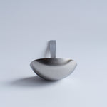 Front view of Sori Yanagi Stainless Steel Ladle showing deep, smooth bowl — minimalist Japanese kitchen design.