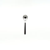 Sori Yanagi stainless steel tea spoon with a polished minimalist design, displayed on a white background for a modern aesthetic.