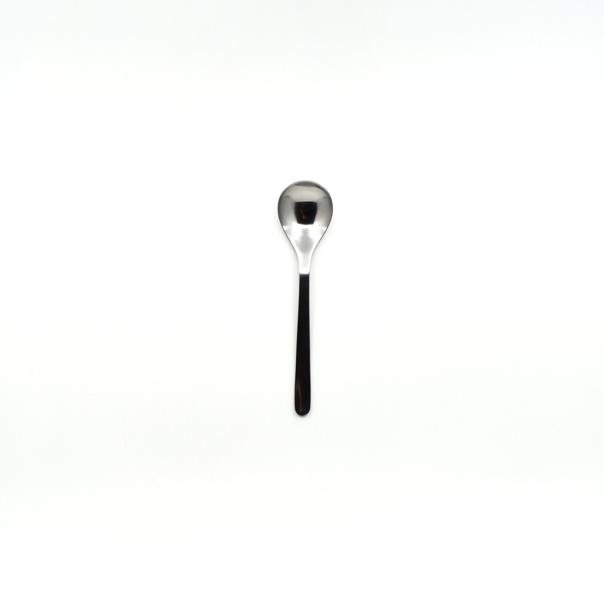 Sori Yanagi stainless steel tea spoon with a polished minimalist design, displayed on a white background for a modern aesthetic.