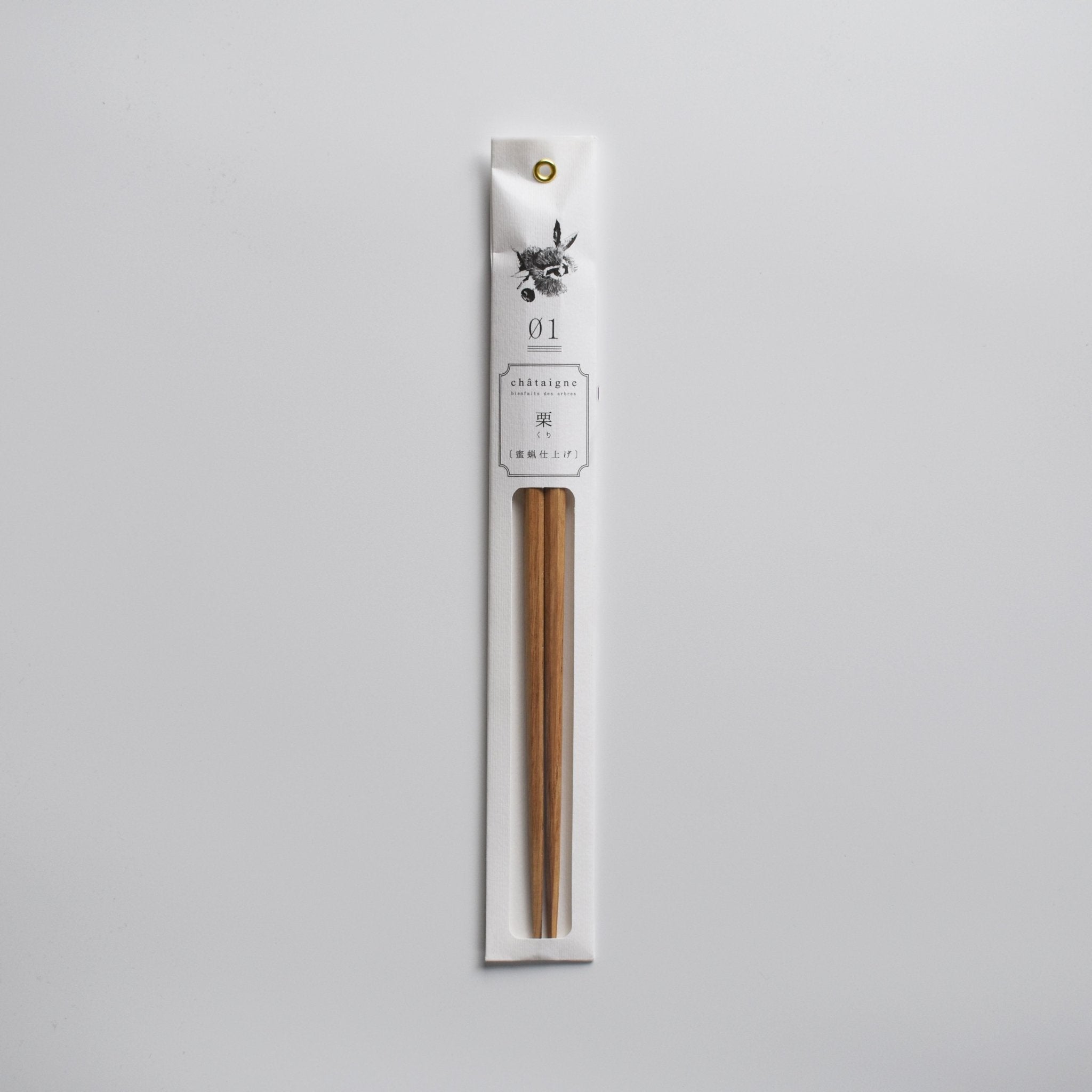 Single pack of Tetoca wooden chopsticks in the Kuri Chestnut wood variant, displayed in original Japanese packaging on a light background.

