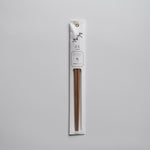 Minimalist packaged chopsticks made from Japanese ume (plum) wood with a delicate floral label design