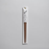 Minimalist packaged chopsticks made from Japanese ume (plum) wood with a delicate floral label design
