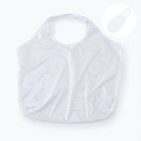 Unfolded view of the white reusable bag with a capsule icon showing storage size