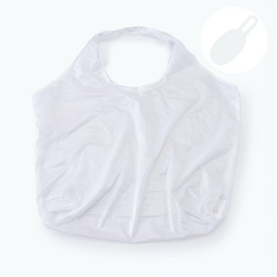 Unfolded view of the white reusable bag with a capsule icon showing storage size
