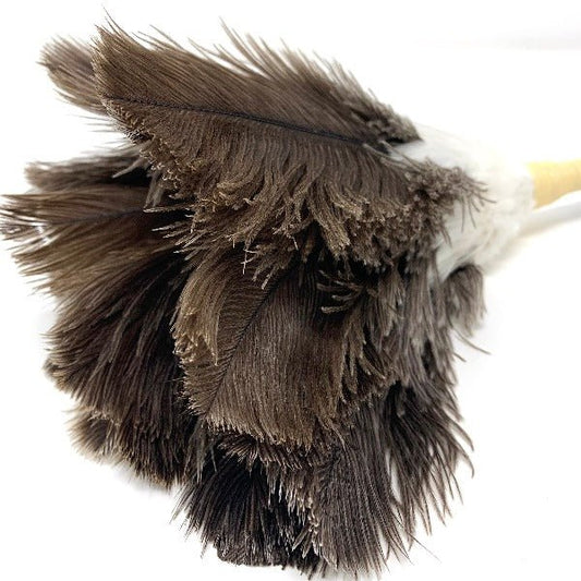 Close-up shot of brown ostrich feathers on a traditional Japanese feather duster, showing soft texture and fine strands for gentle cleaning
